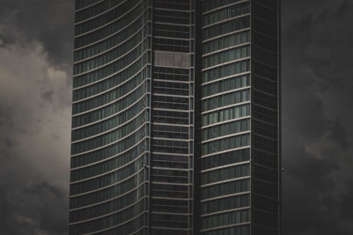 High Rise Building Under a Cloudy Sky