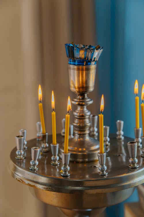 Stainless Candle Holder with Lighted Candles