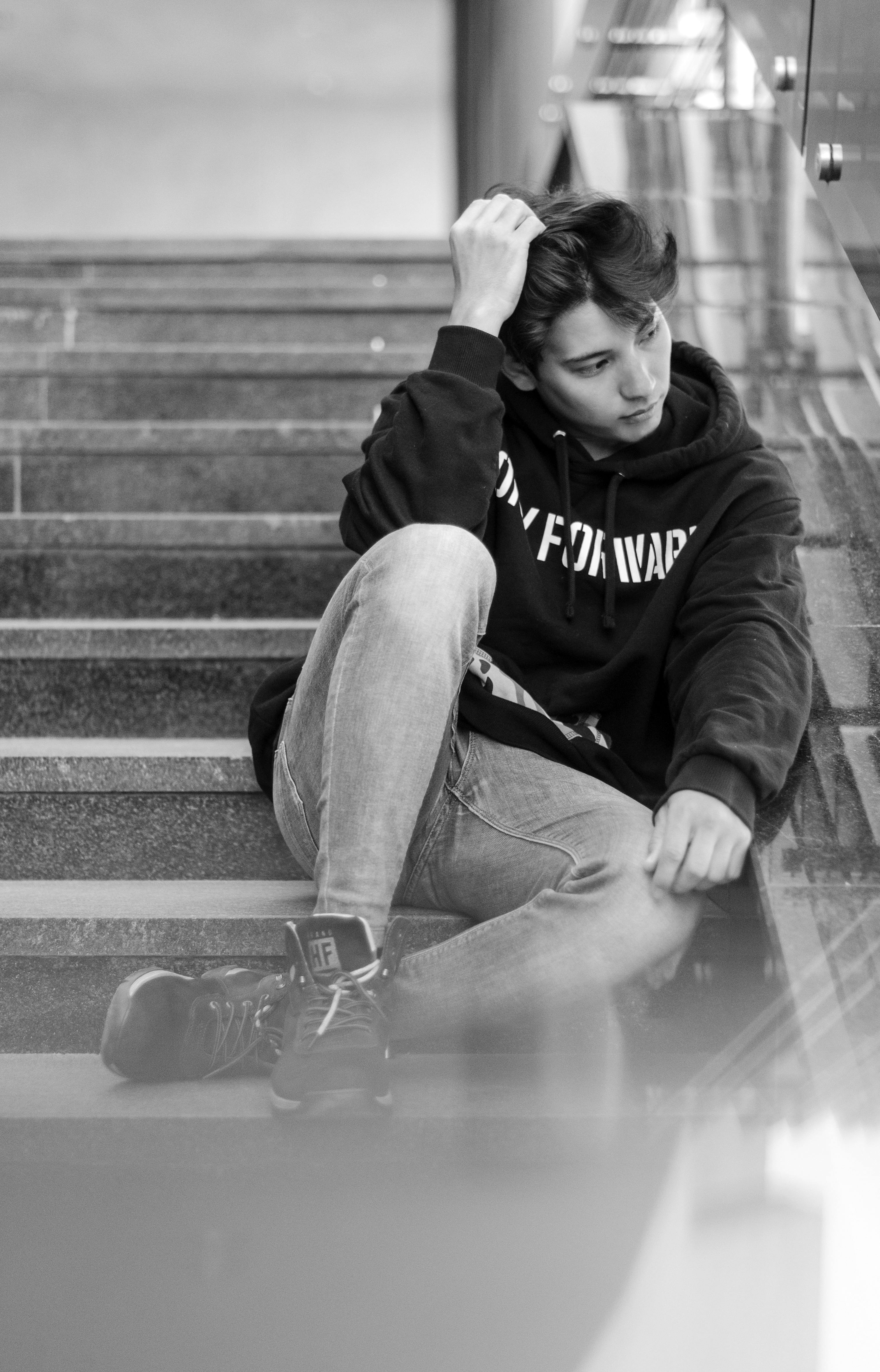 Grayscale Photo of Man Sliding on Handrail · Free Stock Photo