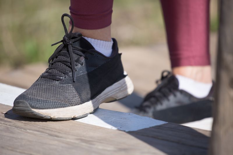 Men's Roamer trainers on stone steps — photo by Kampus Production on Pexels