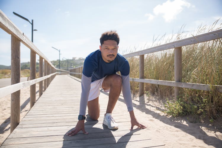 A Man Getting Ready To Run