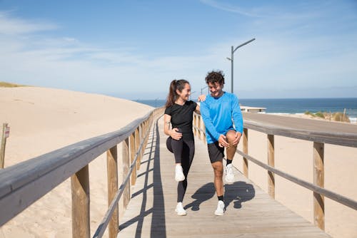 Man and Woman Doing Warm Up Exercise