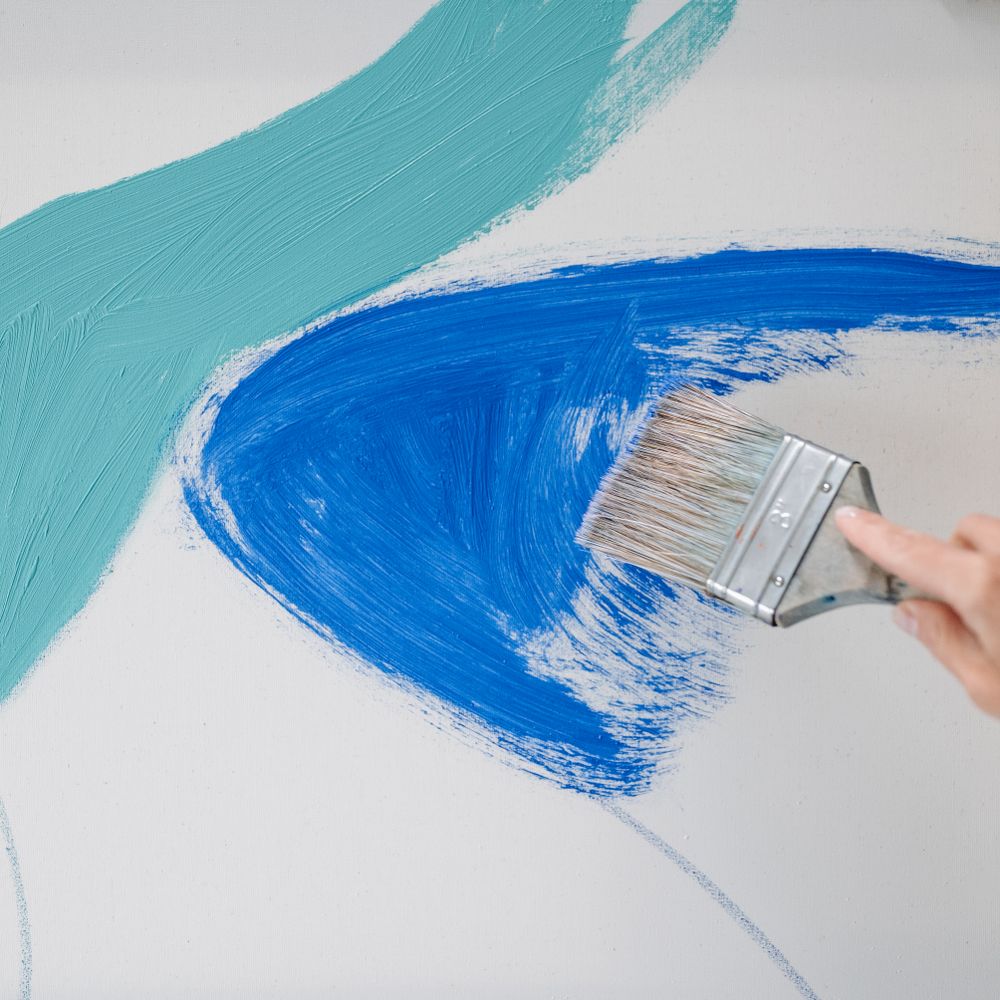 Interior Painting in Tottenham Hale — a decorator at work mid-project