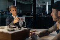 A Detective Showing a Photo of the Victim