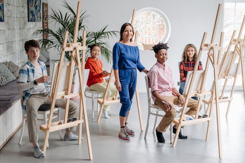 Kids Together with their Teacher in an Art Class