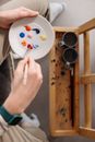 Person Holding White Round Plate