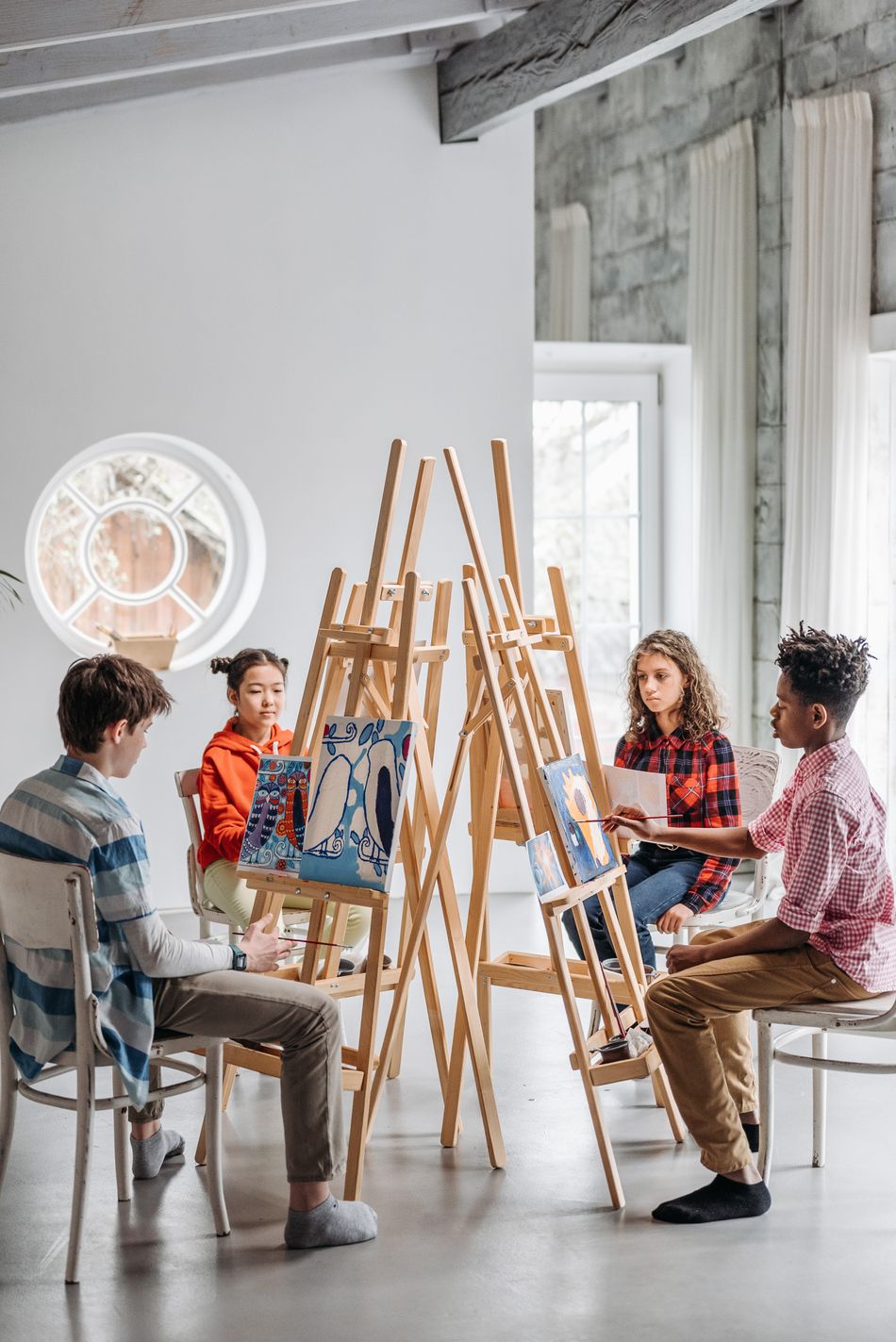 Children enjoying a painting class