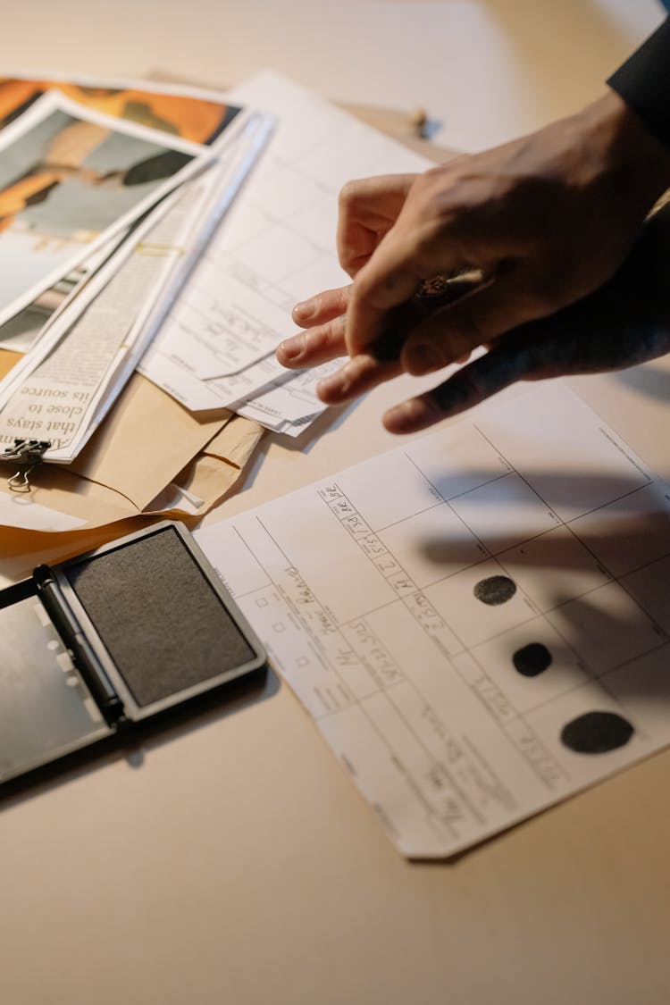 Putting Of Fingerprint On A Document 