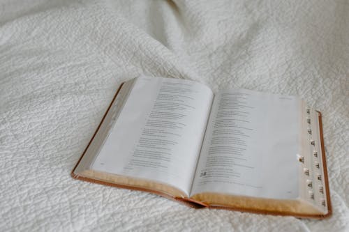 Open Book on White Linen