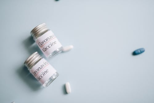 Darmowe zdjęcie z galerii z butelka na pigułki, covid, covid-19 szczepionka