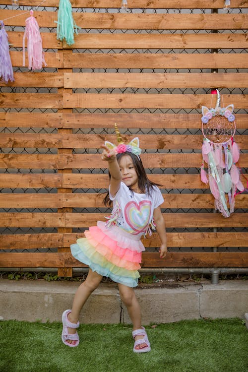 Free A Little Girl Wearing a Unicorn Headband Stock Photo