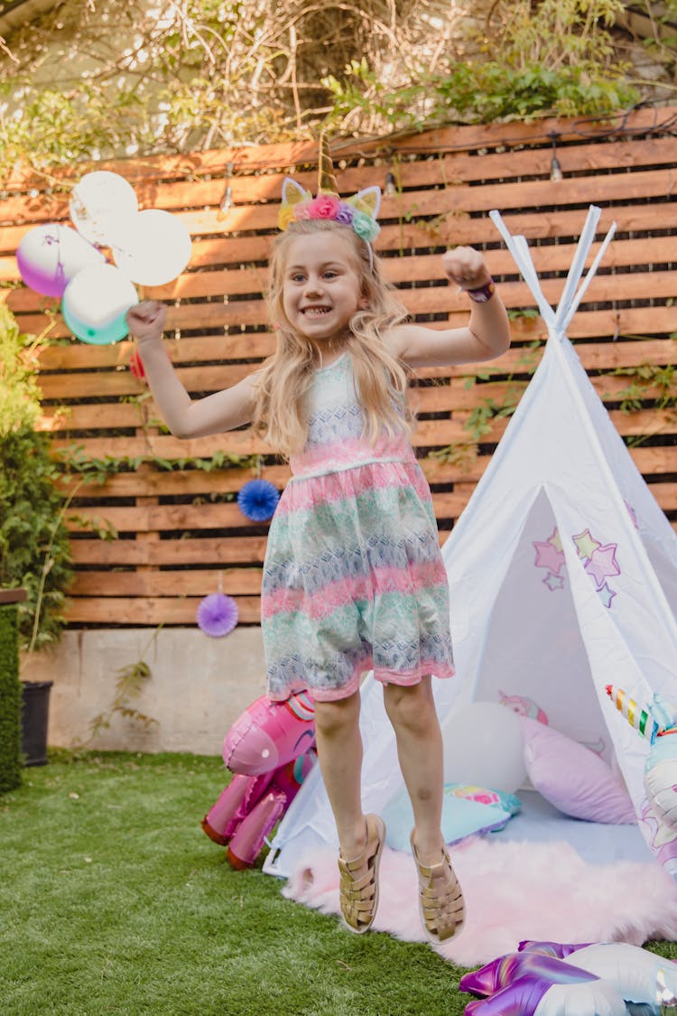 A Girl In A Dress Jumping