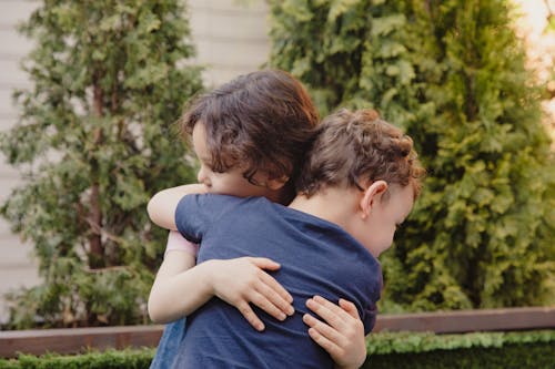 Little Boy and Girl Hugging