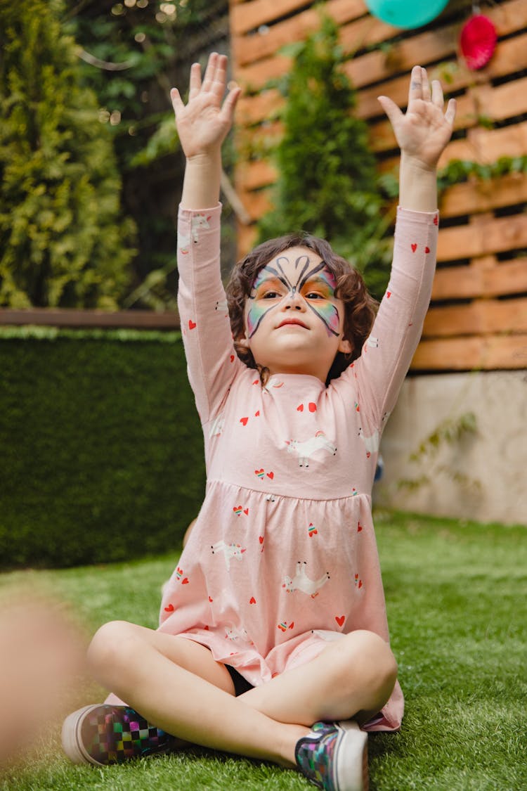 Little Girl Raising Her Hands