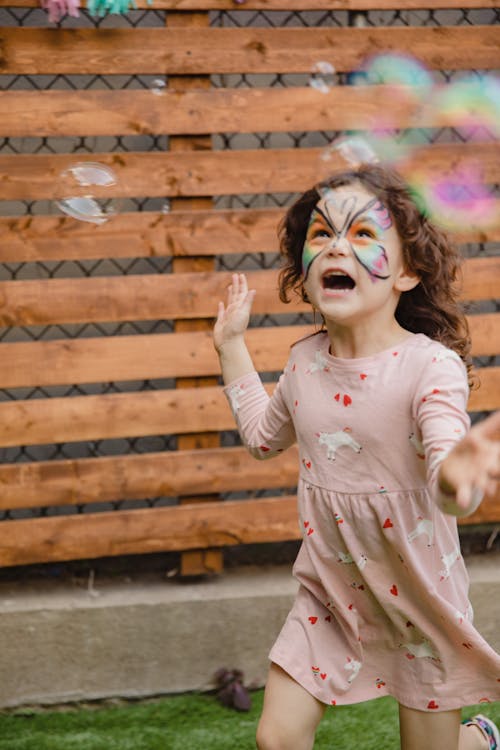 Free A Girl with a Butterfly Inspired Face Paint Stock Photo