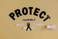 Ribbon representing skin cancer with tube