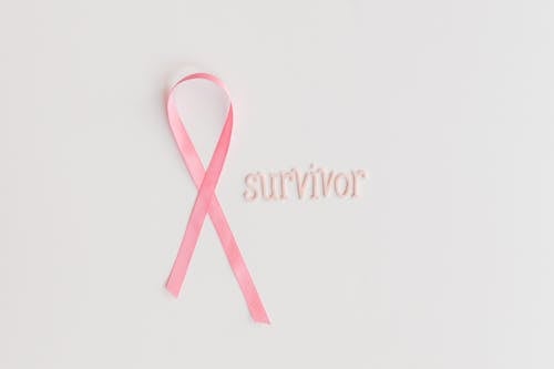 Pink Ribbon on a White Surface