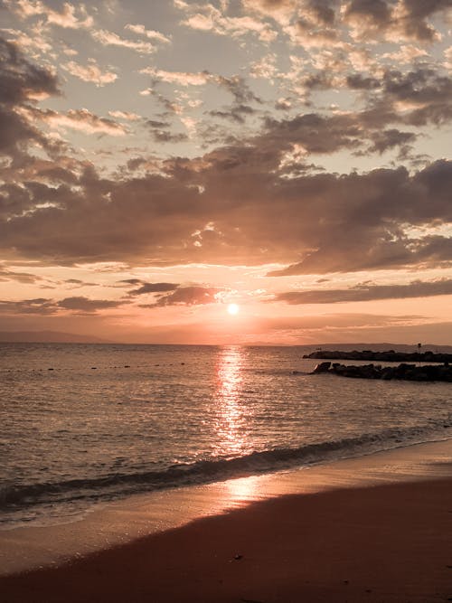 Ilmainen kuvapankkikuva tunnisteilla auringonlasku, hiekkaranta, horisontti