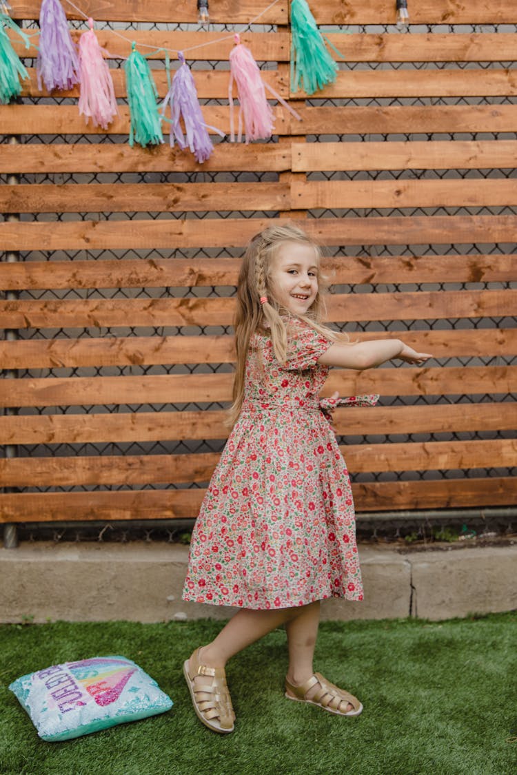 A Girl In Red Floral Dress