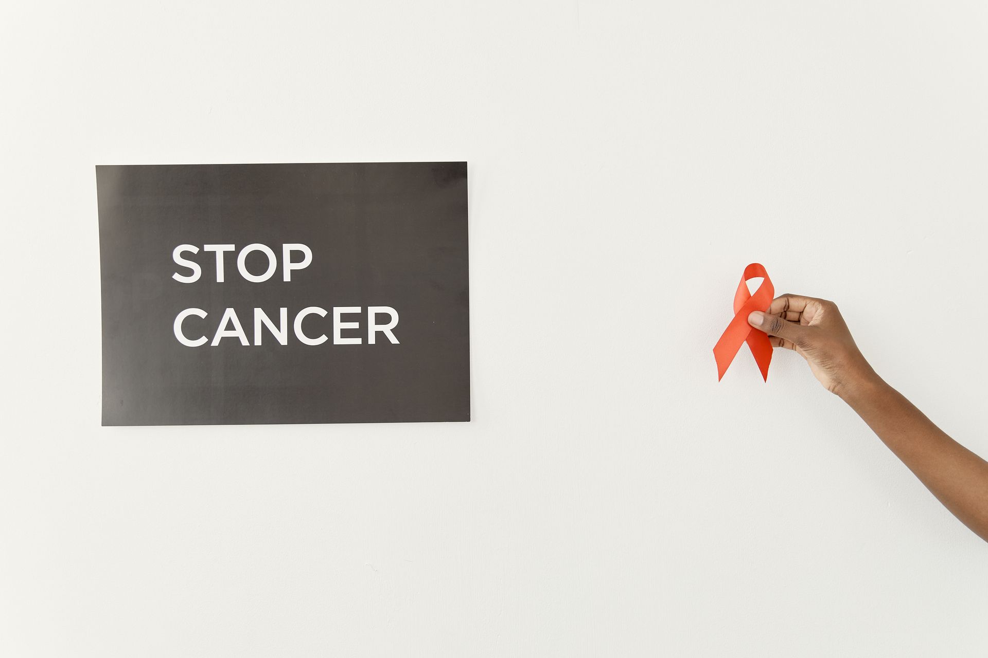 Advocate holding an Orange Ribbon