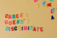 Colorful Letters on a Beige Colored Surface
