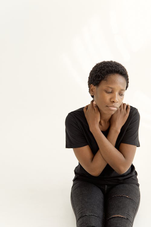 A Woman Sitting on the Floor