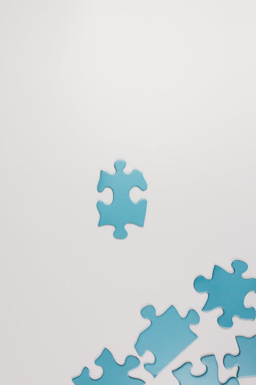 Free Close-Up Shot of Puzzle Pieces Stock Photo