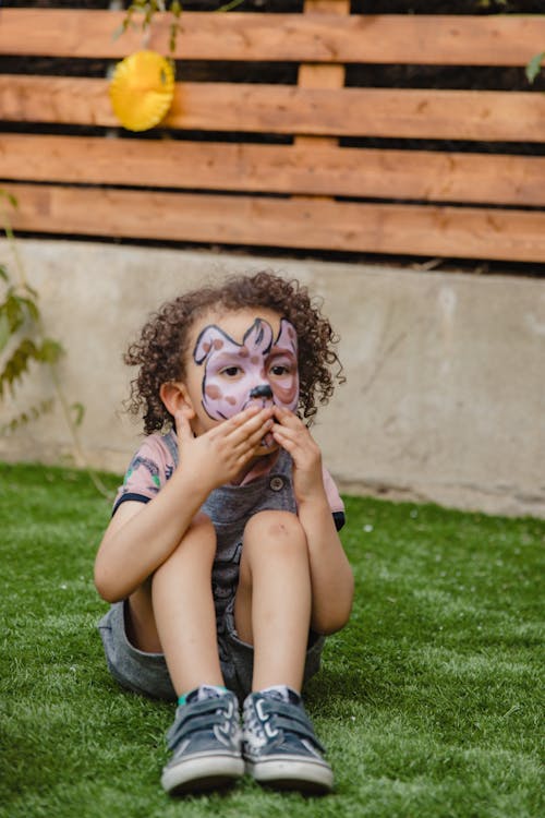 Cute Young Girl with Face Paint 