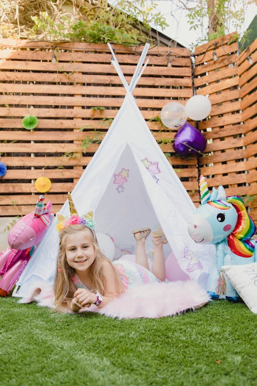 Cute Young Girl on a Tent 