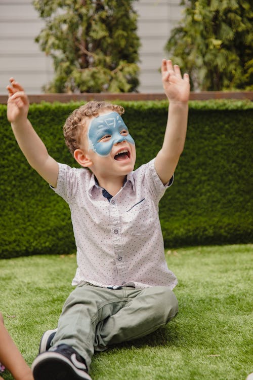 Cute Young Boy with Face Paint