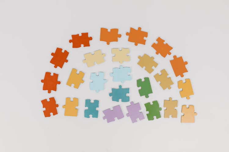 Colorful Puzzle Pieces On White Background