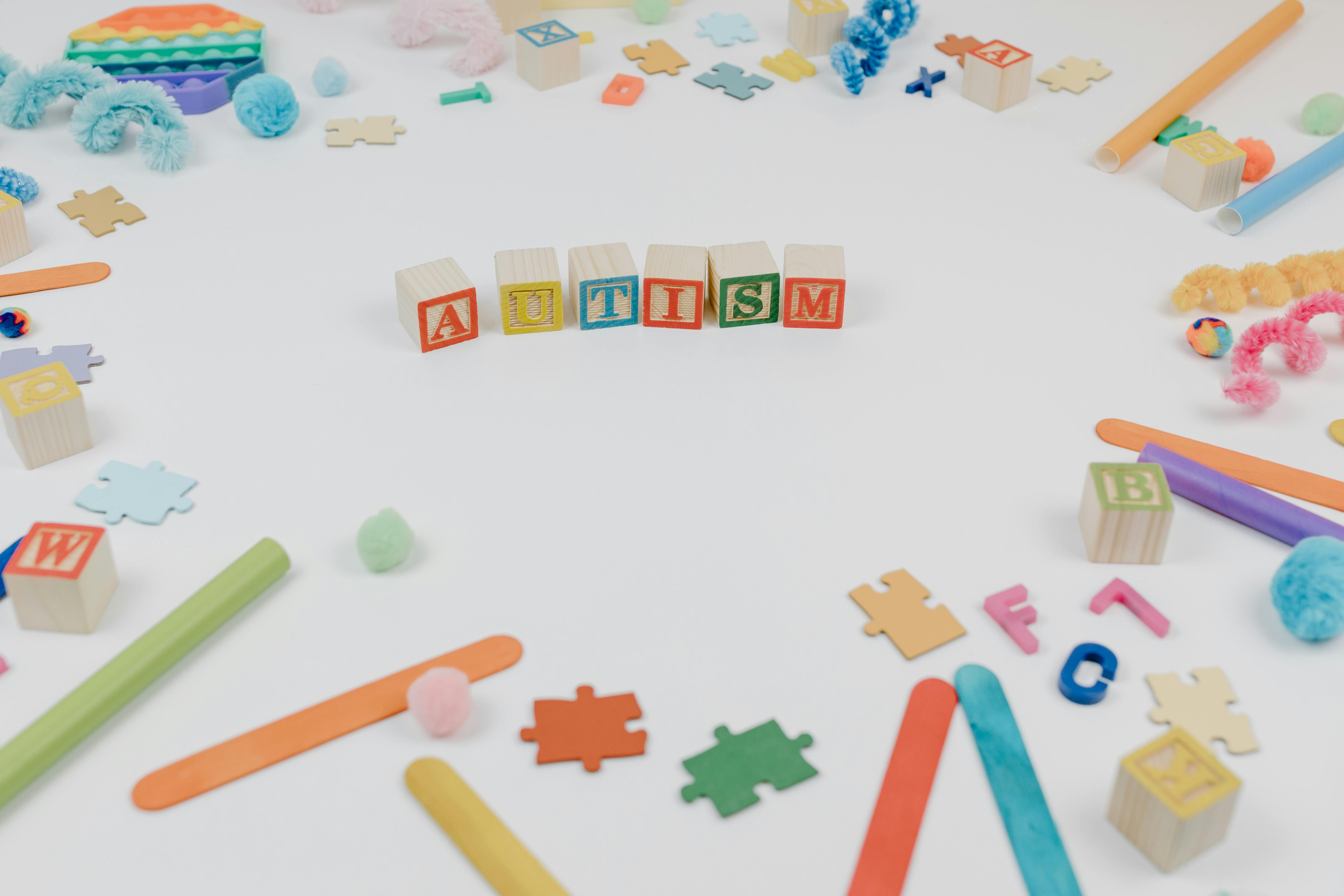 Autism Spelled Using Wooden Blocks On A White Surface Free Stock Photo   Pexels Photo 8385985 