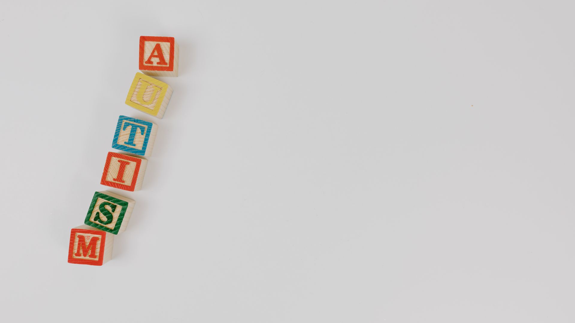 Modafinil for Autism Related Fatigue: An Effective Solution Wooden blocks spelling 'AUTISM' on a white background emphasizing awareness — modafinil for autism related fatigue