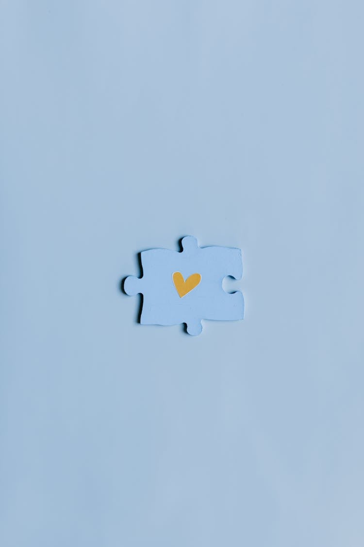 Heart Shape On A Blue Puzzle Piece