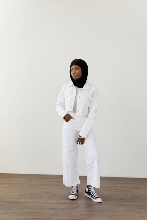 A Woman in a White Outfit Wearing a Hijab