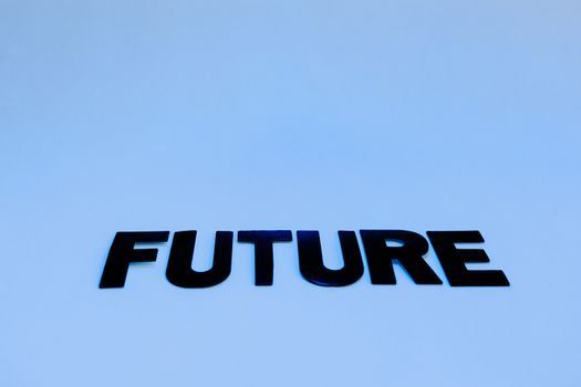 Bold 'Future' text on a serene blue background symbolizing optimism and potential.