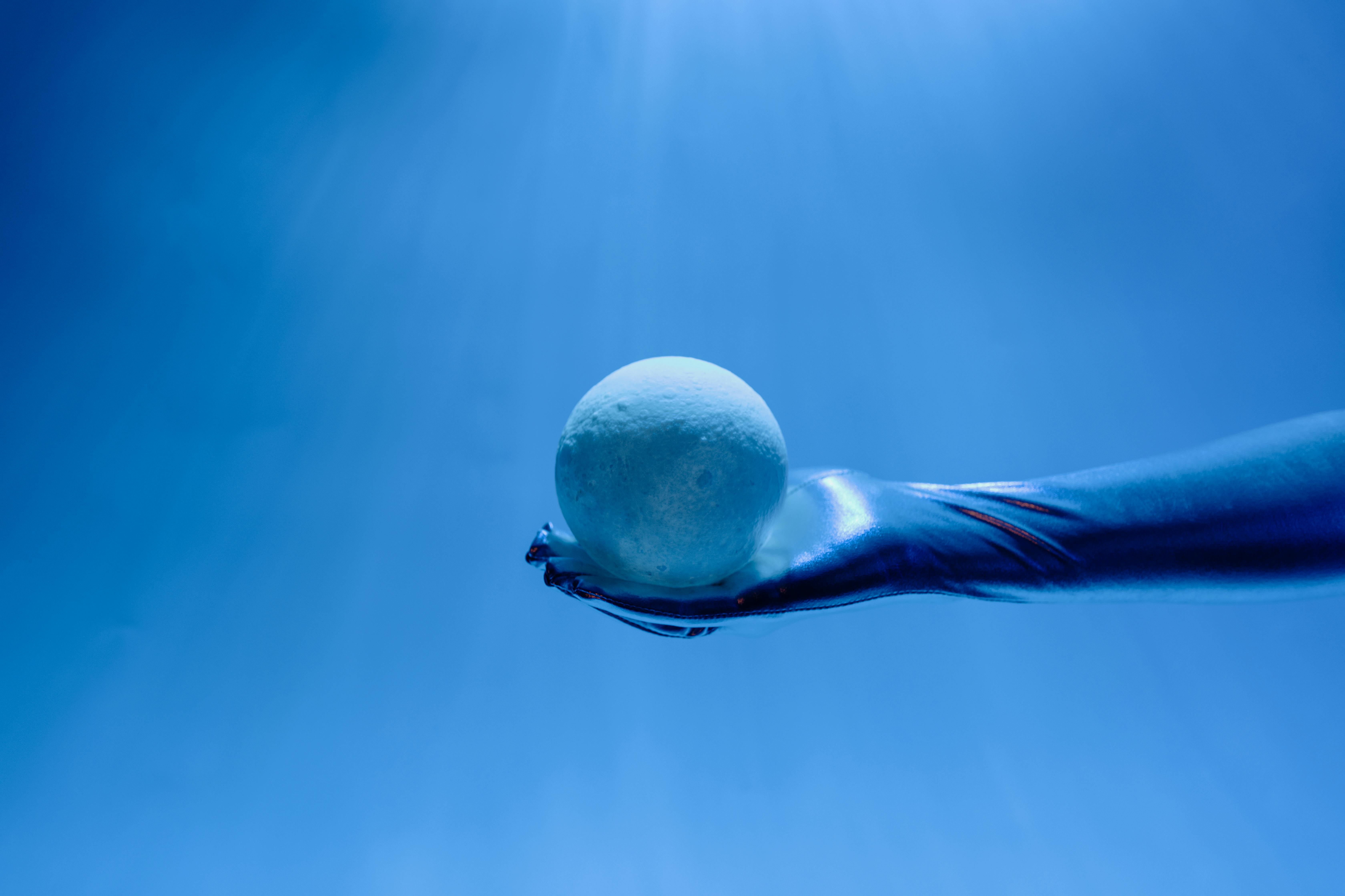 Diverse group of professionals collaborating over laptops and legal documents