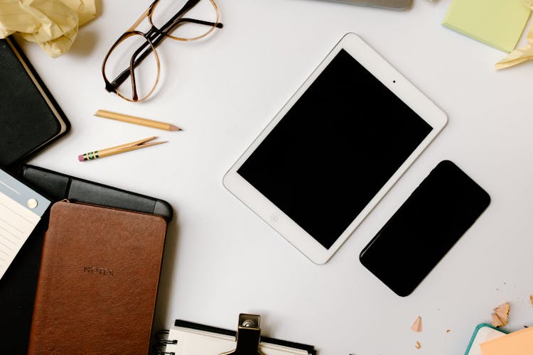 Electronic Gadgets On White Table