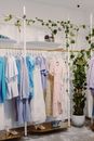 White Dress Shirt Hanging on Gold Clothing Rack