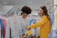 Women Checking Clothes in a Boutique