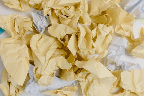 Crumpled White and Yellow Paper