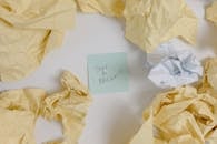 Green Sticky Note on White Surface