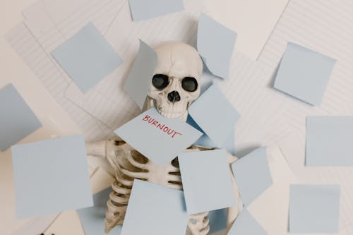 Free 
A Skeleton Buried with Sticky Notes Stock Photo