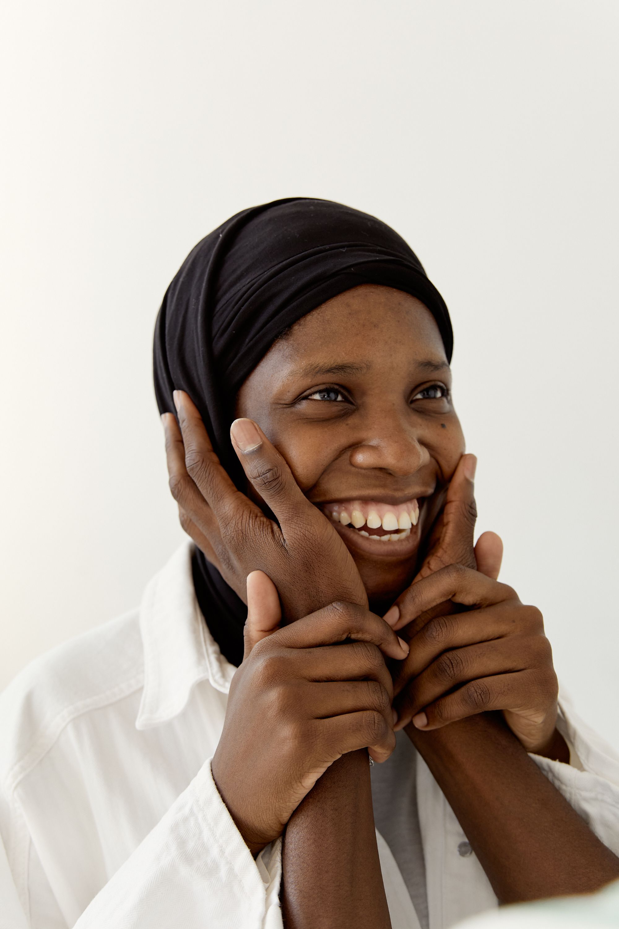 Person Holding Woman's Face Smiling · Free Stock Photo