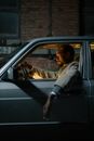 Side View of a Man Sitting in a Car