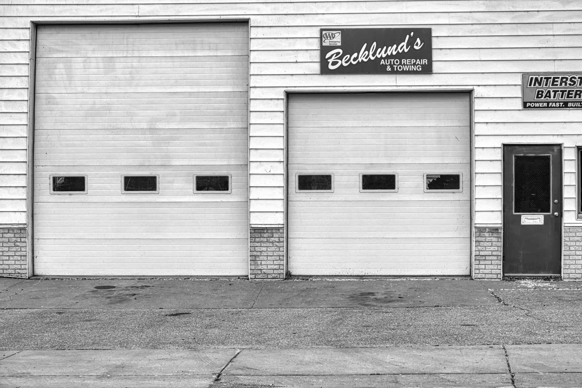 Monochrome image of Becklund's Auto Repair & Towing facade in Millville, MN.