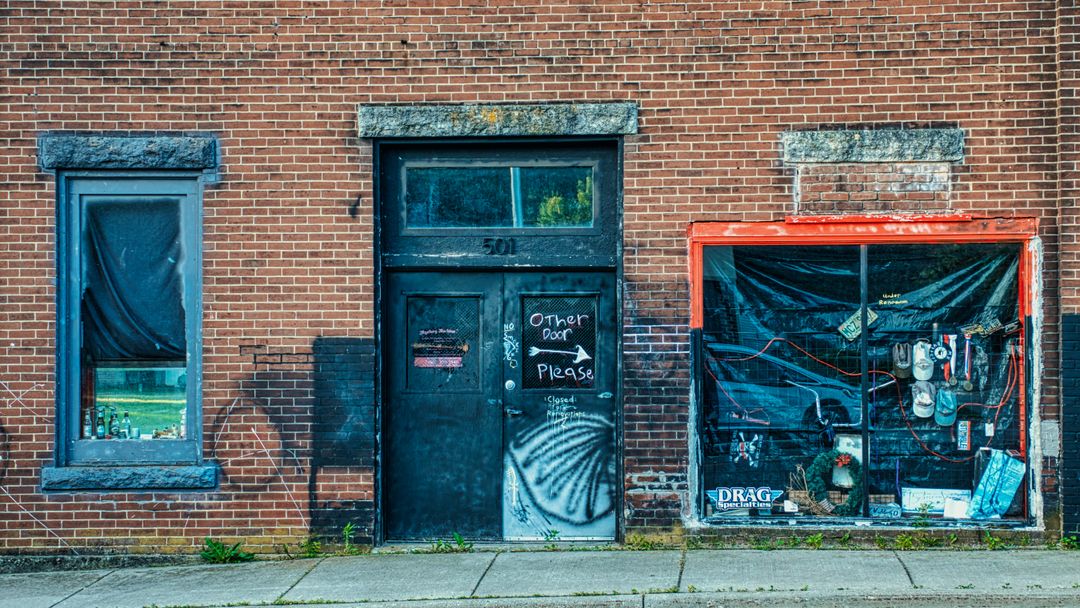 An empty building nobody is watching. That is the whole of why these properties get stripped.