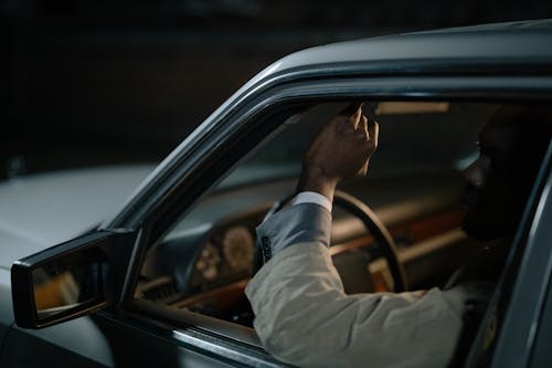 Free A Man Driving a Car Stock Photo