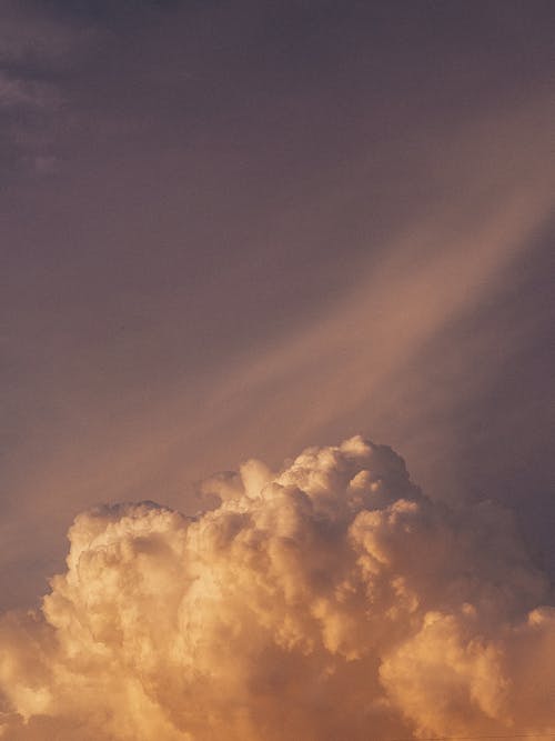 Fluffy Cloud on a Sunset Sky 