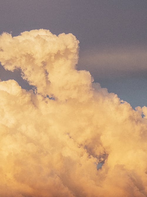 White Puffy Clouds and Blue Sky